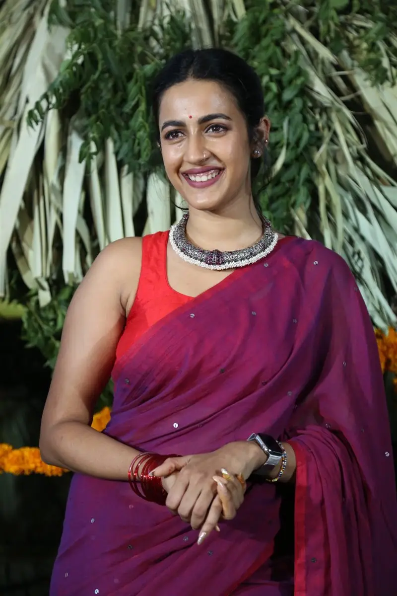 Niharika Konidela Stills in Violet Saree Sleeveless Orange Blouse